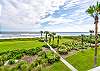 Beautiful Views from the Balcony with the beach walkover right next to the building. 