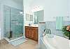 Blue Hues in the Master Ensuite features soaking tub and separate shower and dual vanities. 