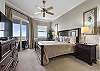 King Primary Suite with Sliding Glass Door out to the Balcony!