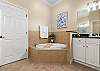 Primary Ensuite with Soaking Tub, Separate Shower, and Double Vanities.