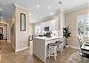 Beautifully Remodelled Kitchen featured Waterfall Edge Countertop!