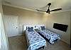 3rd Bedroom feature 2 Twin beds that can convert to a King.