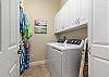 4 Beach Chairs and beach umbrella are stored in the laundry room!