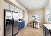 Large Kitchen with a window allowing beautiful morning light to pour in. 