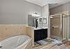 Primary Ensuite with soaking tub and separate shower. 