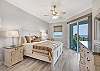 King Master Bedroom with Sliding Glass Door to the Balcony and Atlantic Views. 