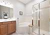 Master Bathroom Features Soaking Tub and separate Shower.