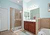 Master Bathroom features double vanities, shower and separate soaking tub.