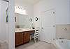 Master Bathroom with shower and separate soaking tub.