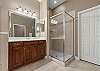 King Ensuite with dual vanity, soaking tub and separate shower. 