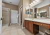 King Ensuite with dual vanity, soaking tub and separate shower. 