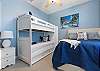 Guest room with bunkbed and a Queen size bed. 