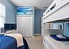 Guest room with bunkbed and a Queen size bed. 