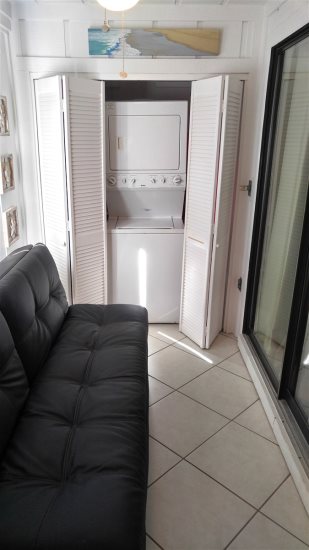Enclosed Patio with Futon & Laundry in Closet