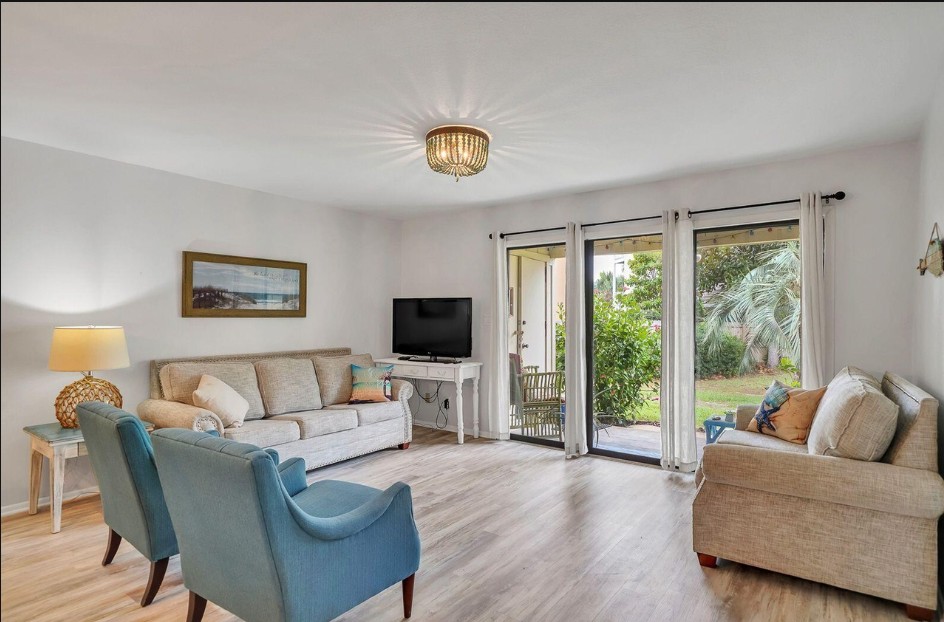 Den with Sliding Door to Private Patio