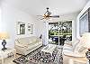 Relax in the formal living room while the kids are being kids in the family room.
