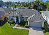 beautiful lakefront 4 bedroom vacation rental with west facing pool in Briarwood, Naples, FL