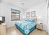 this 2nd primary bedroom also hosts a king size bed and ensuite bathroom.