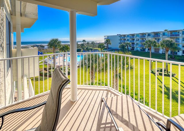 Ocean view patio features a table with seating for six and an electric grill for outdoor barbequing. Perfect spot to relax and unwind! 