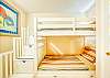 The smaller third bedroom known as the “Crow’s Nest” is a cozy place for the children to sleep and make their own!