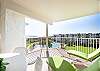 Ocean view patio features a table with seating for six and an electric grill for outdoor barbequing. Perfect spot to relax and unwind! 