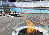 Fire pit is inside pool enclosure