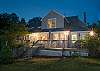Beautiful home in Bar Harbor has large back deck --  perfect for vacation gathering spot.