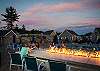 Enjoy happy hour at the firepit at the pool