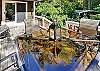 extra dining table on the porch for outdoor meals