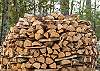 We provide your first pack of firewood and bucket of kindling.  More firewood is available for sale.