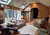 Den is just off the kitchen
