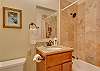 All 3 bathrooms are beautifully tiled and have granite vanity counters.