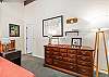 There is ample storage in the large dresser in the loft.