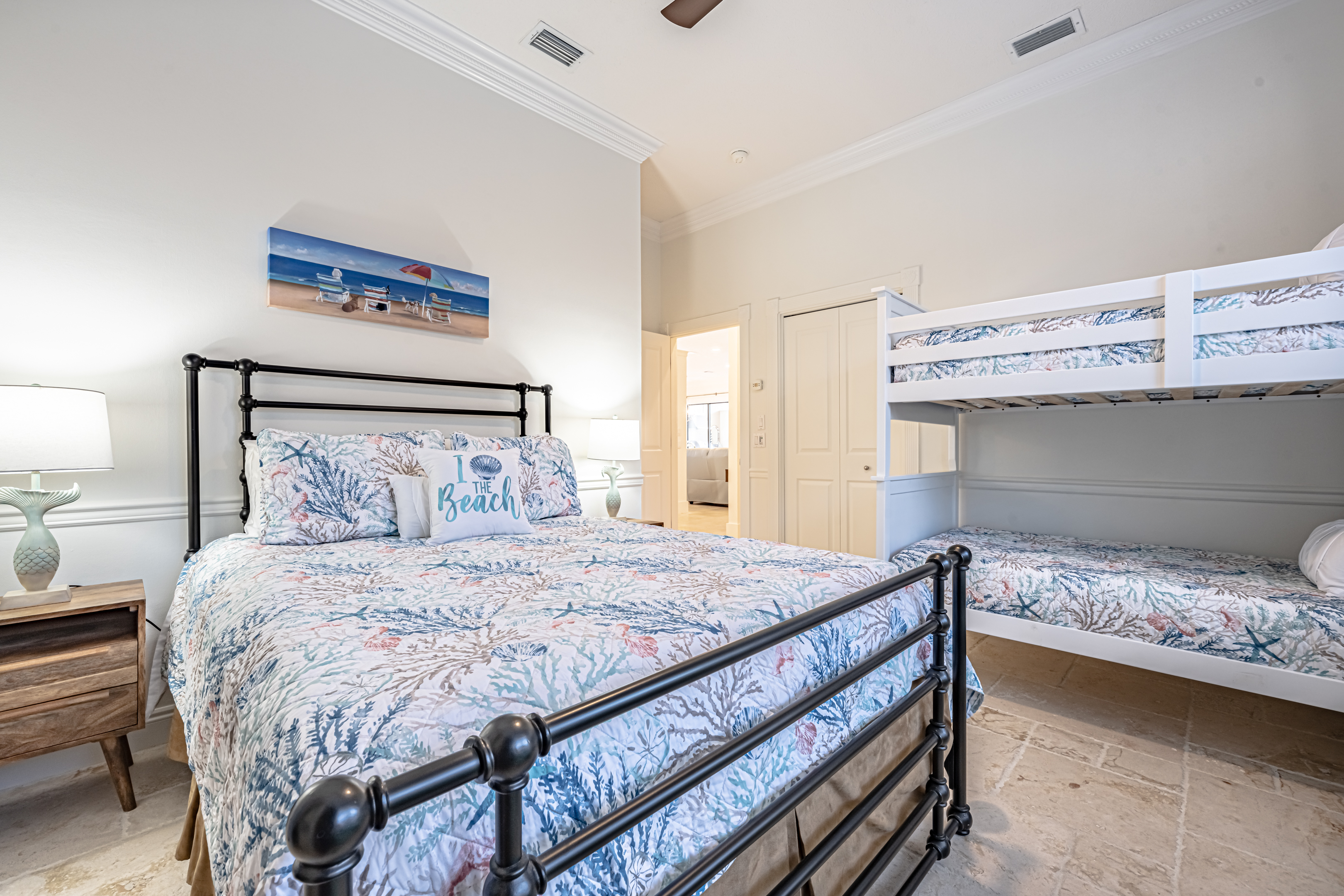 Guest bedroom with queen bed and bunk beds