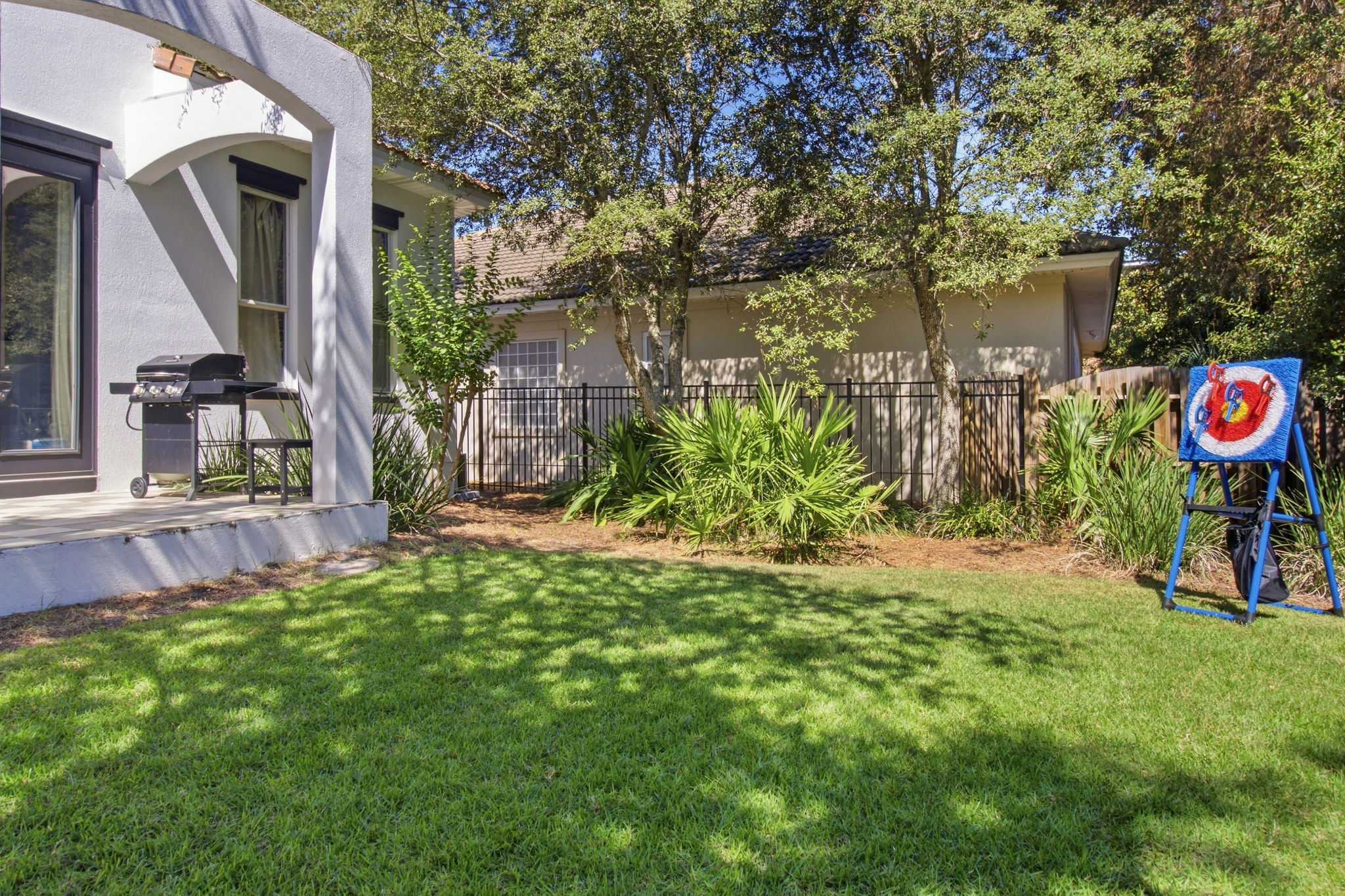Fun fenced in backyard