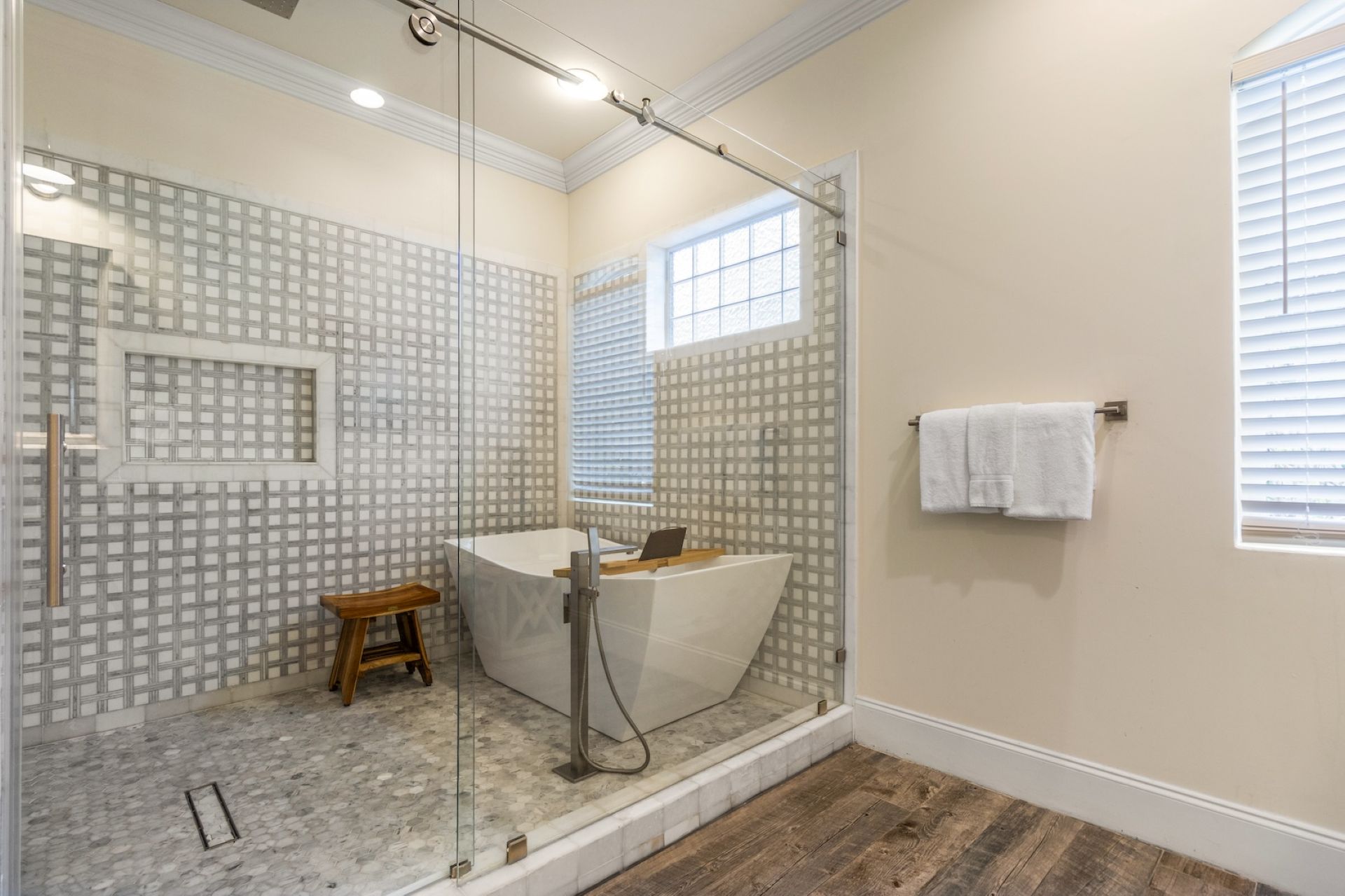 Primary walk-in shower with tub