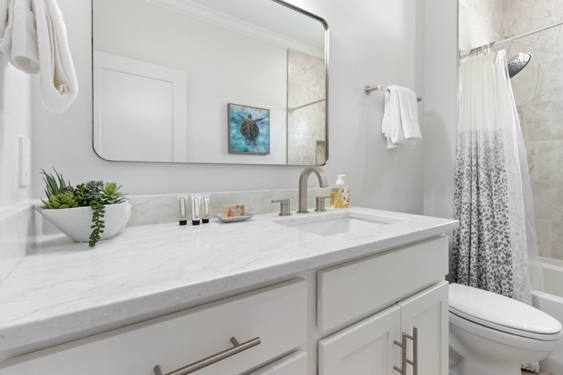 Spacious third floor guest bathroom vanity