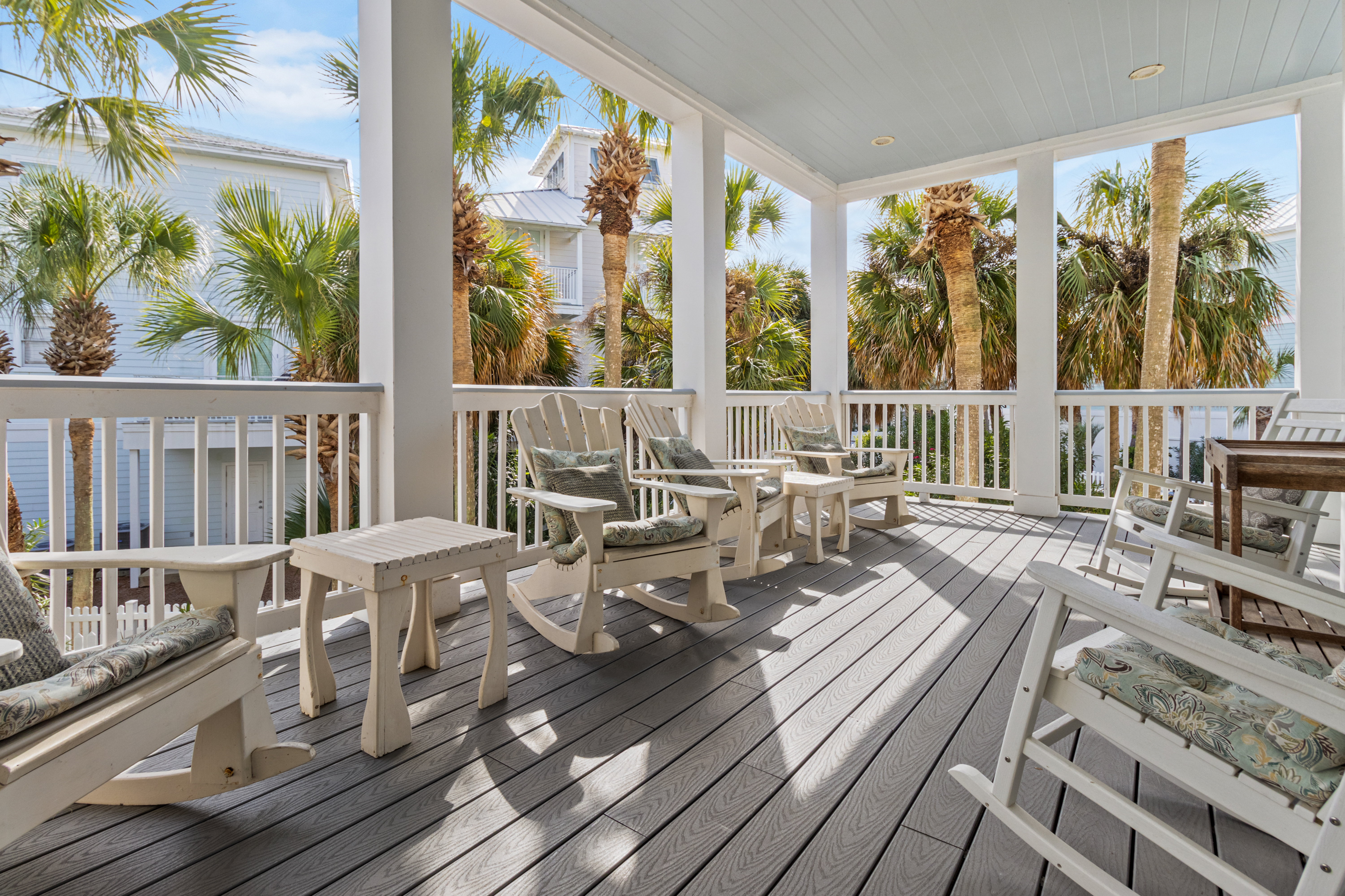 Large balcony with rocking chairs