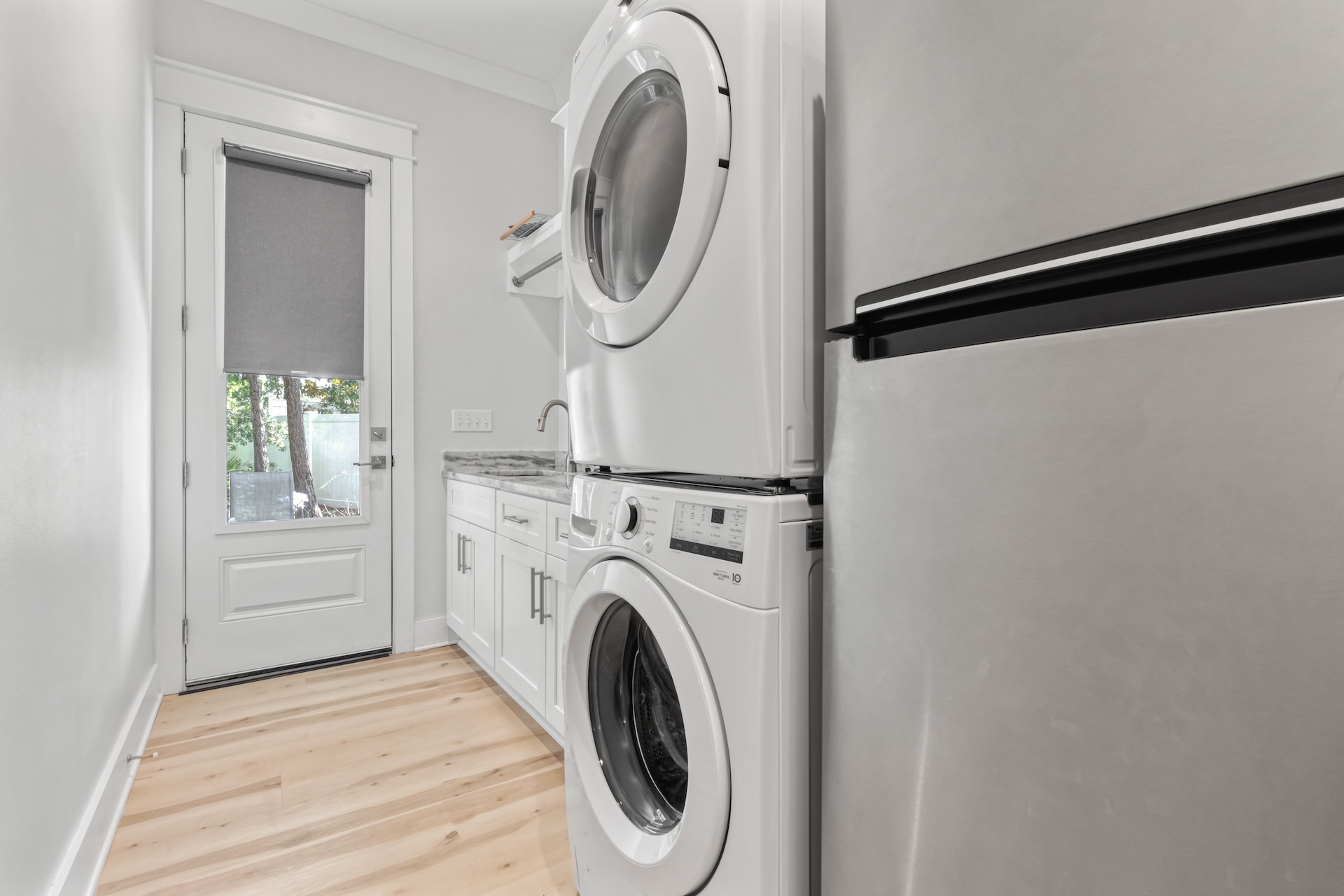 First floor laundry and extra refrigerator