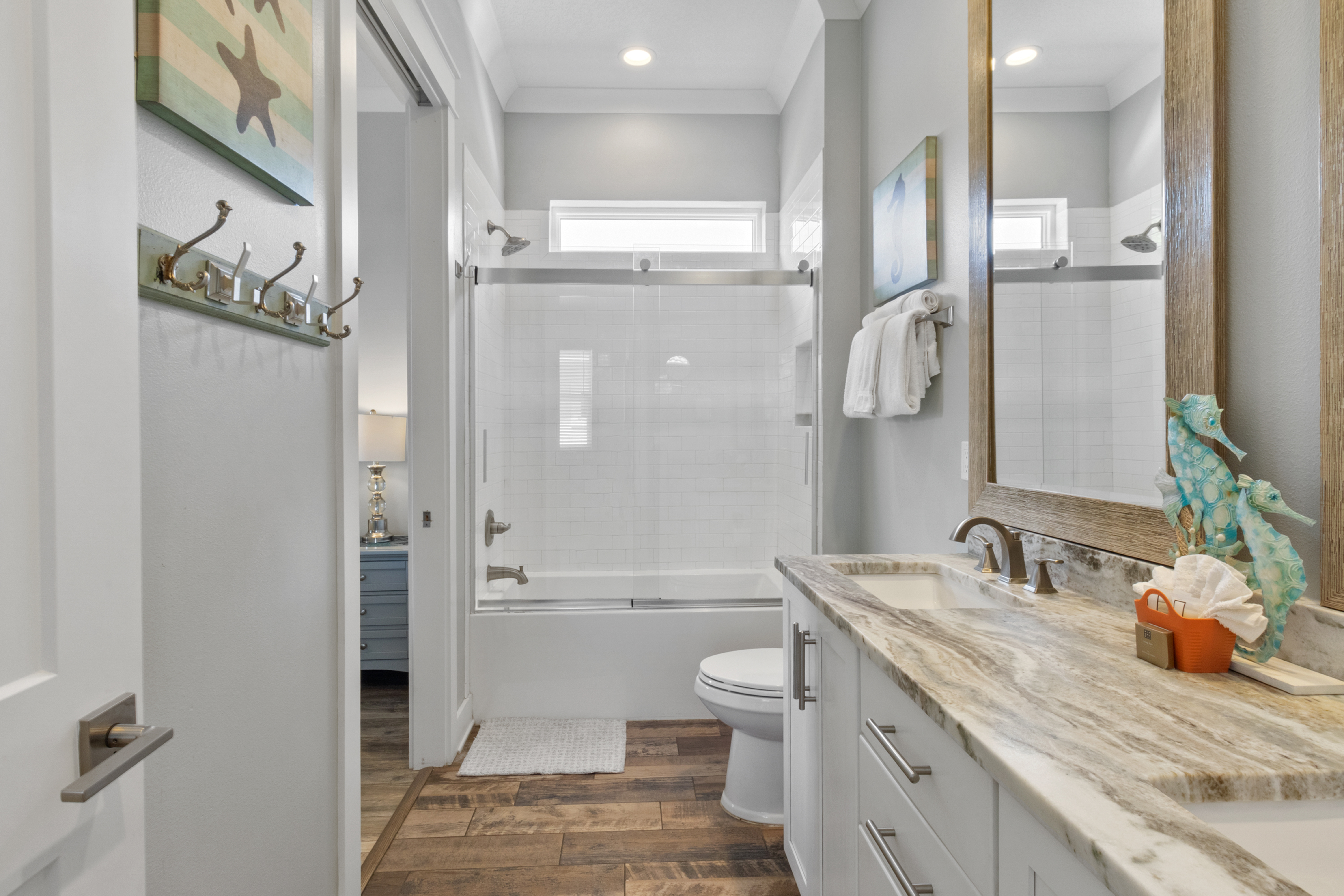 Second floor shared bathroom with hallway entrance