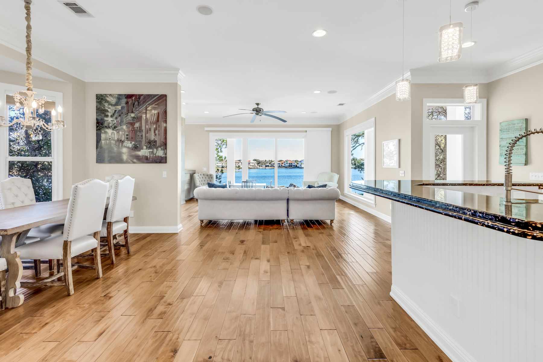 Large windows with electronic blinds on all three floors