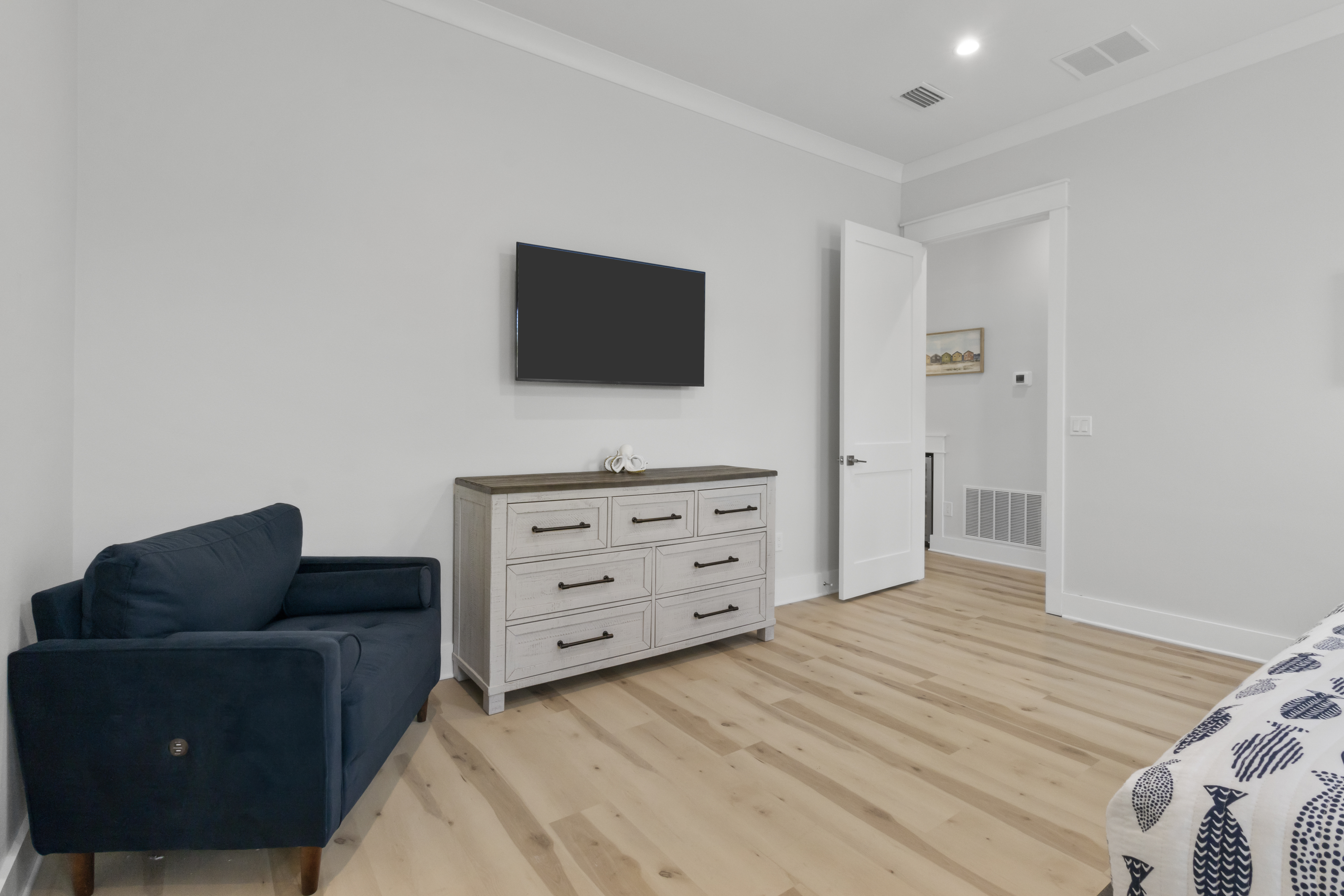 Extra seating and smart TV in primary suite