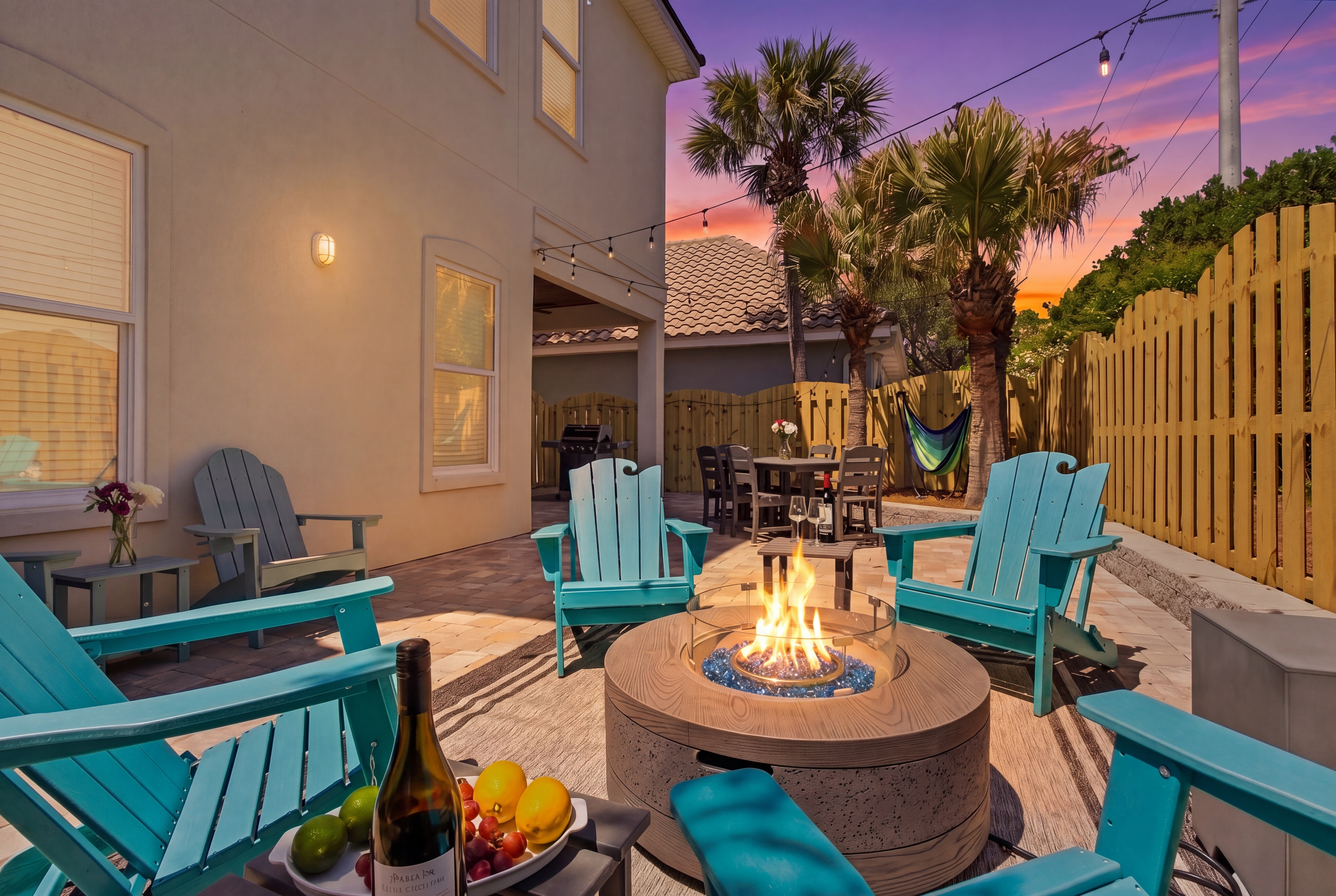 Enjoy cozy nights by the backyard fire pit