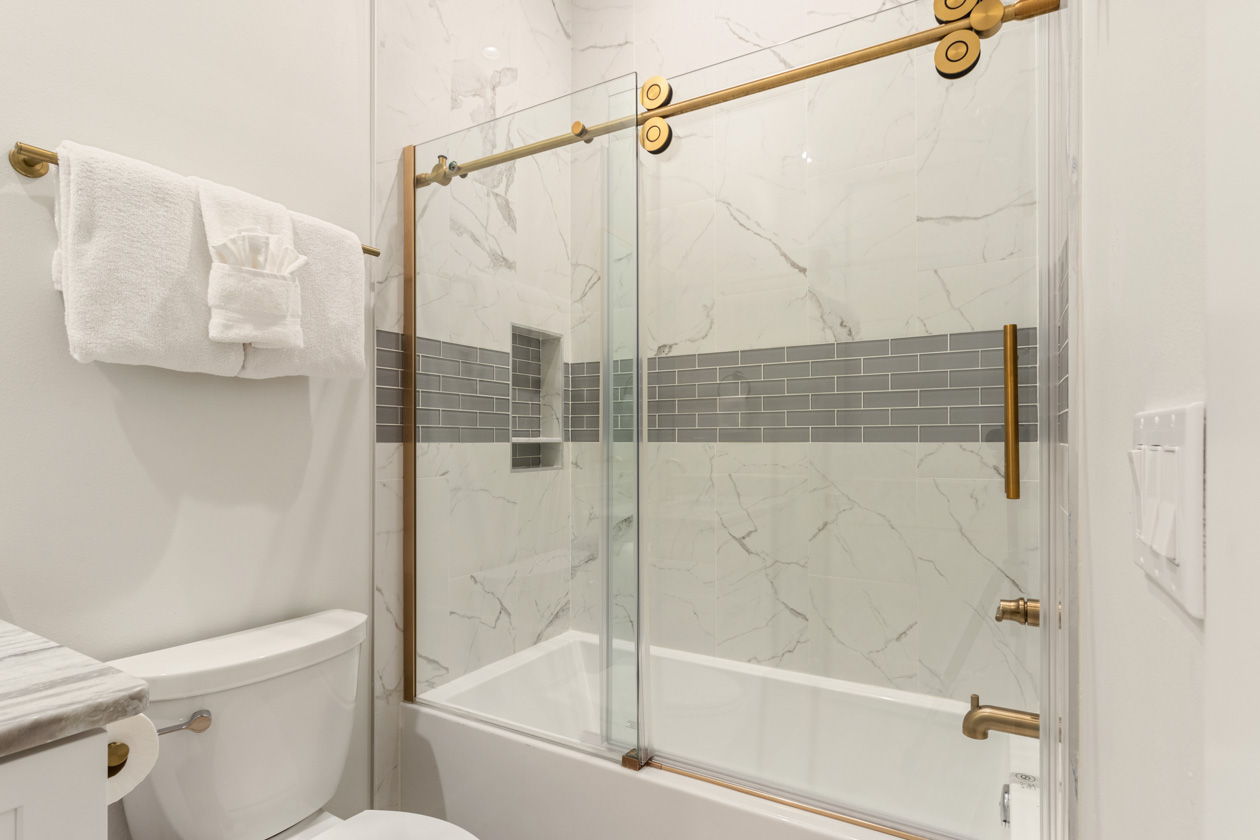 Second floor shared bathroom with tub/shower combo