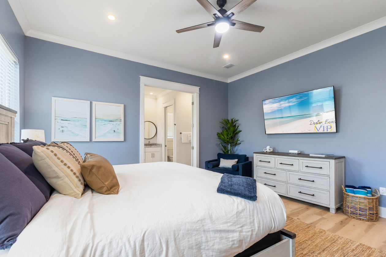 Spacious primary suite with comfortable king bed