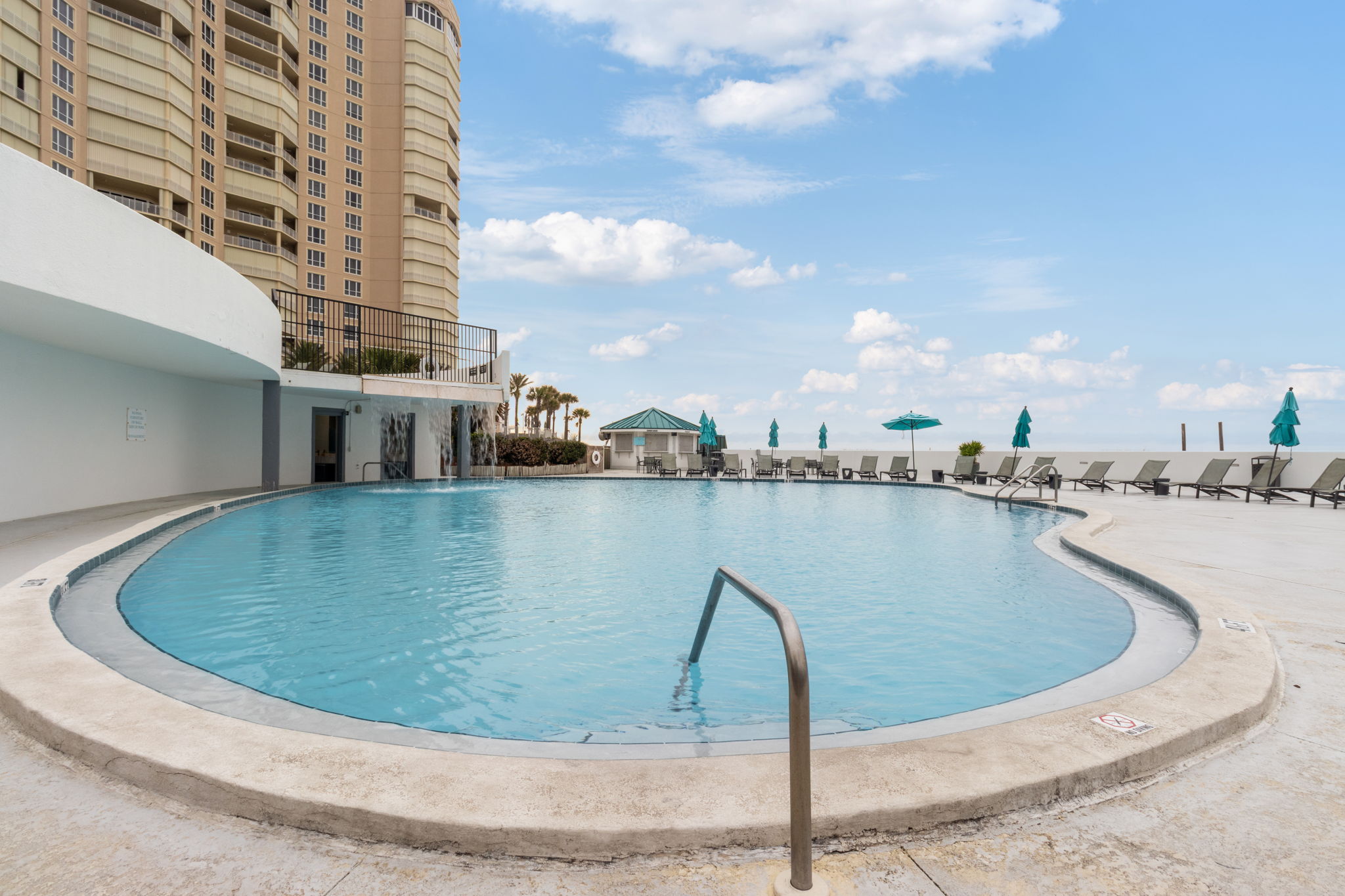 Lower-level pool with waterfall