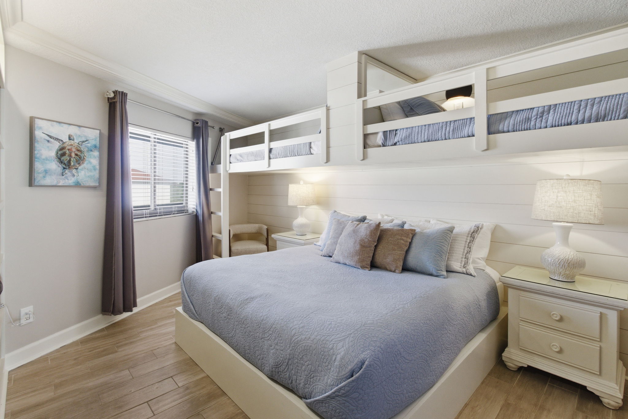 Guest bedroom with king bed and bunk beds