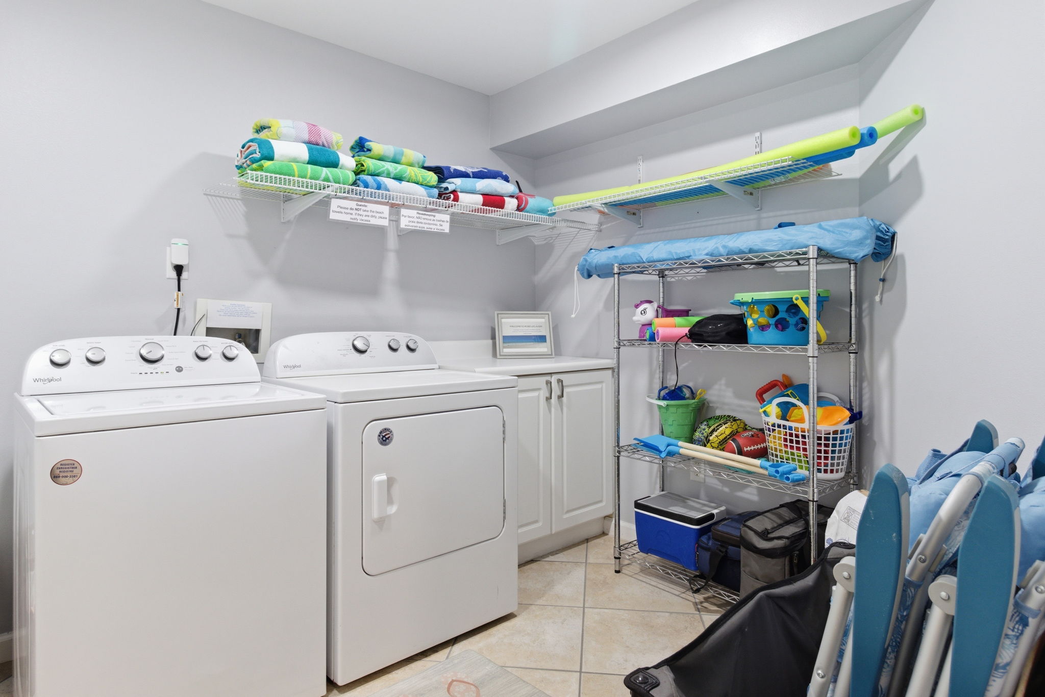 Convenient laundry in unit with beach gear