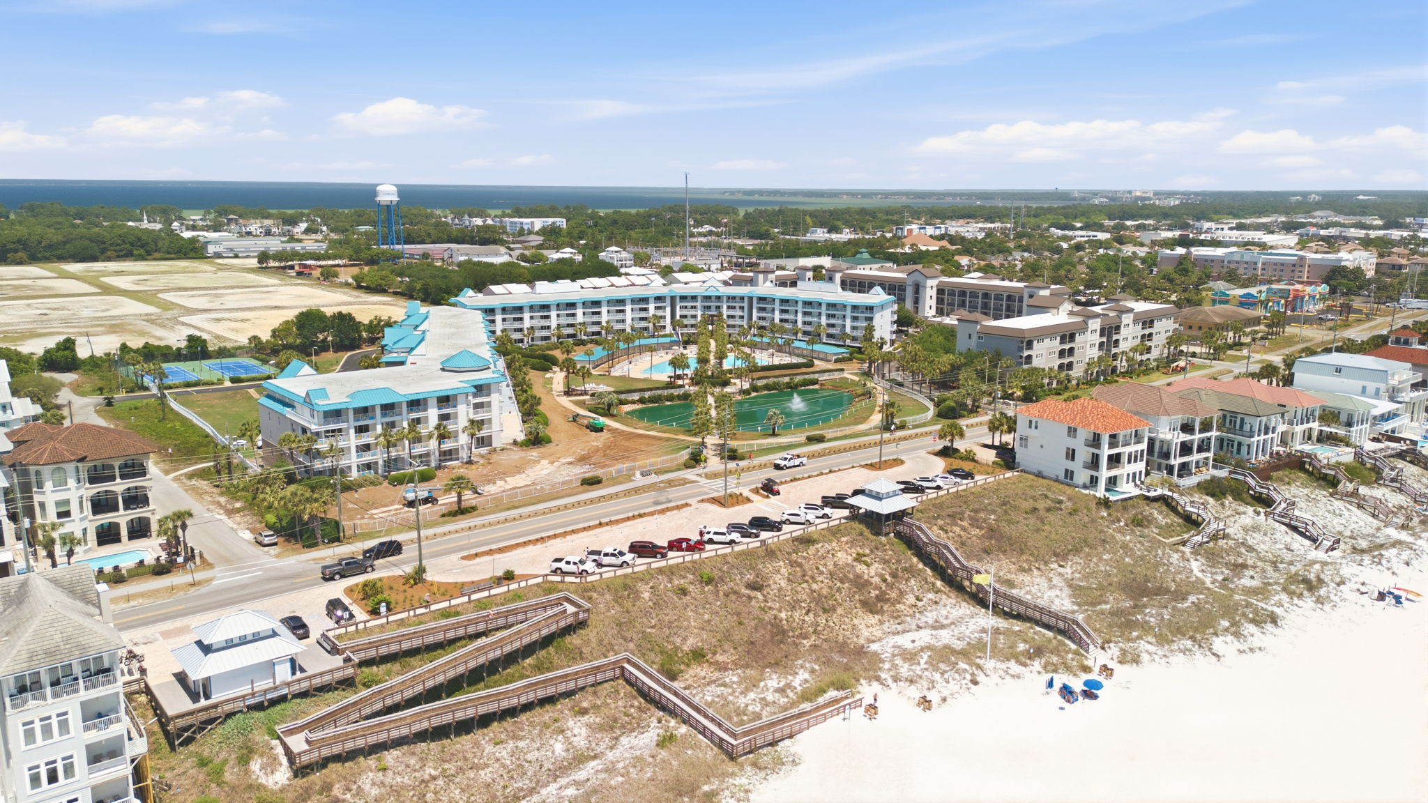 Right across the public beach with a convenient ramp, stairs, an