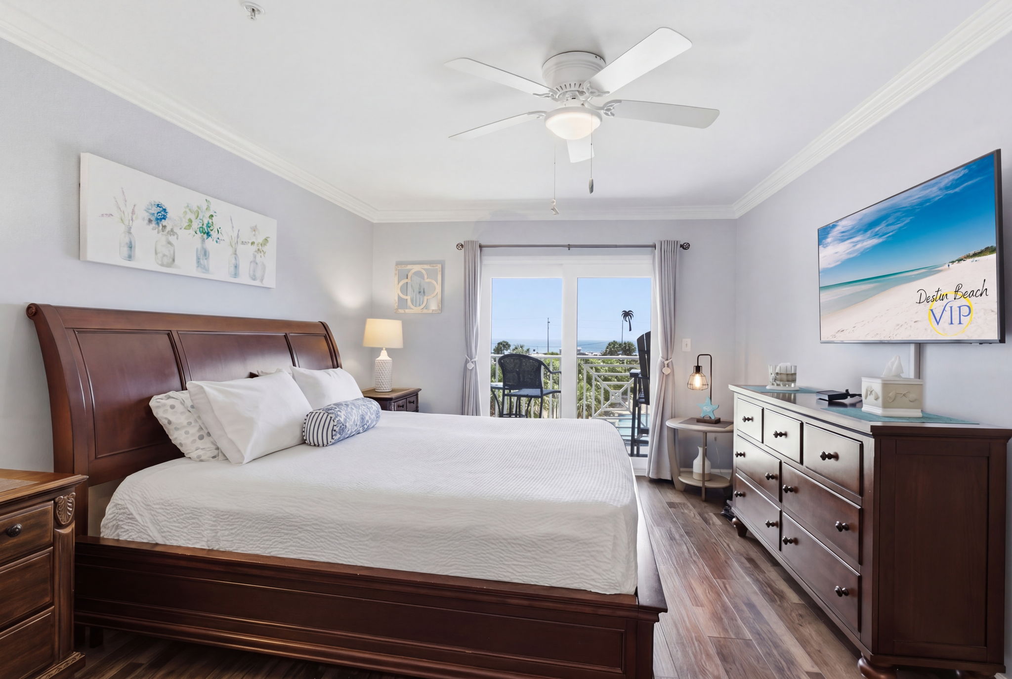 Primary bedroom with king bed and smart TV